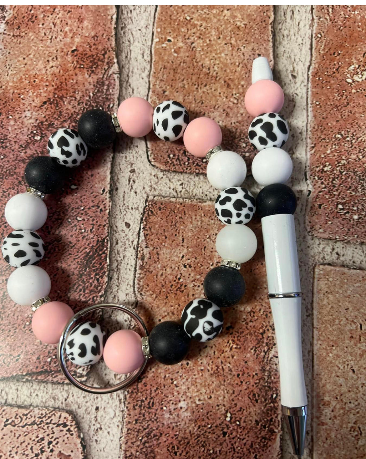 Pink cow wristlet keychain set