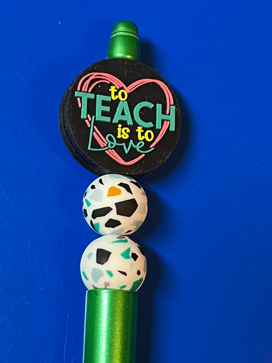 To teach is to love pen